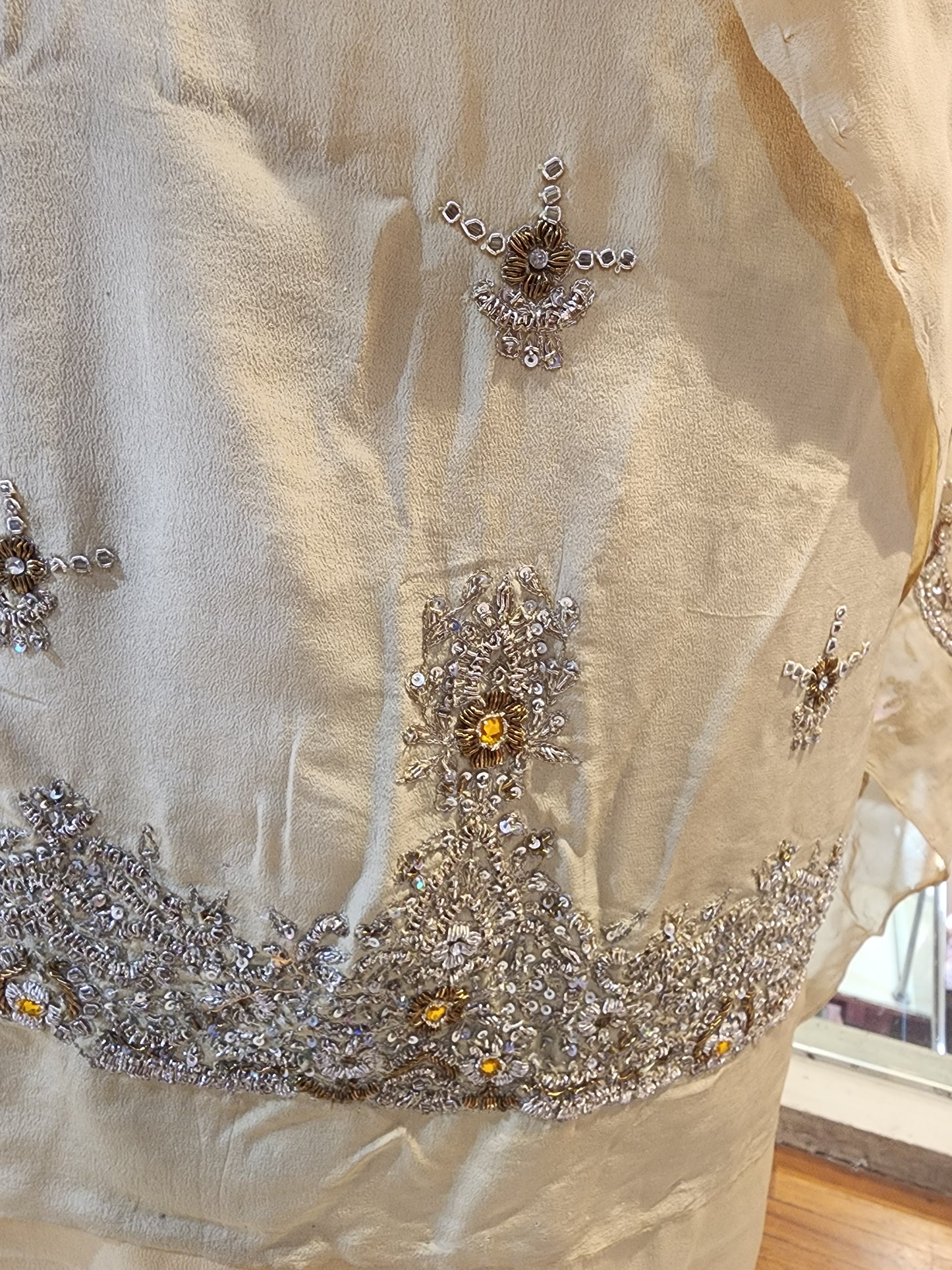 Golden pure crepe dabka work suit with heavy jaal work dupatta
