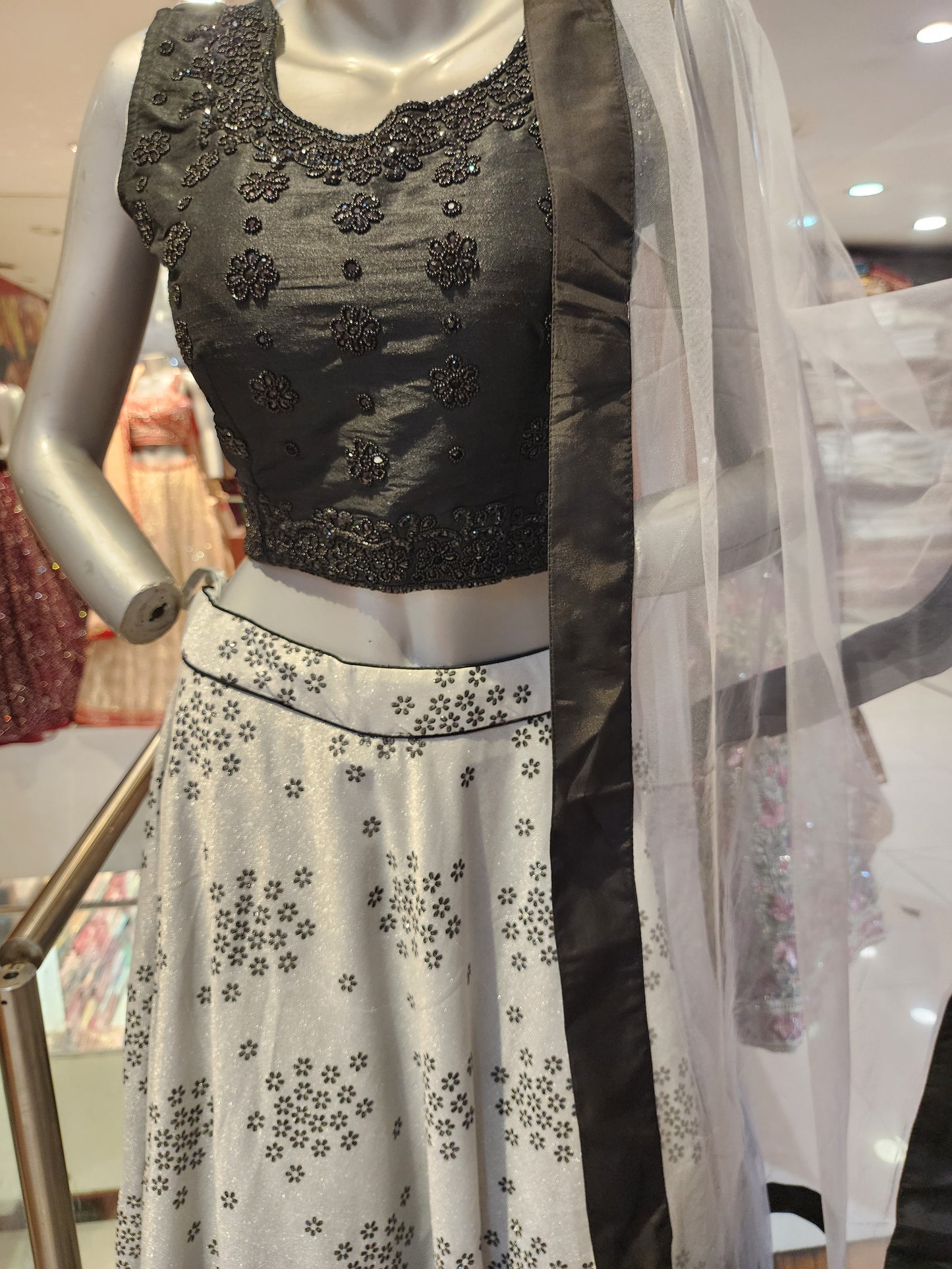 Grey and black lehanga with net dupatta