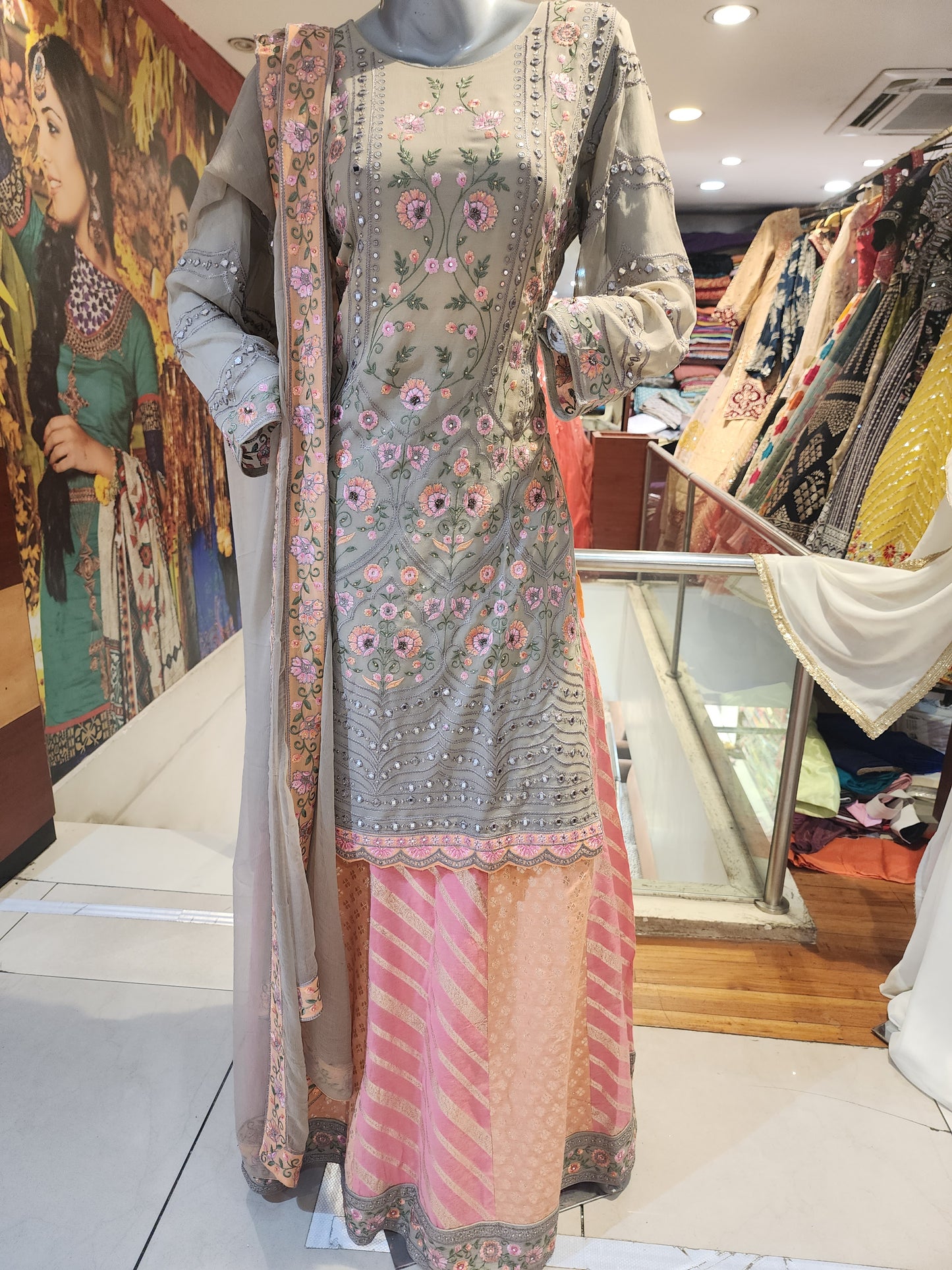 Grey colour georgette resham work +mirror work shirt with semi brocade peach skirt with georgette dupatta with border ,