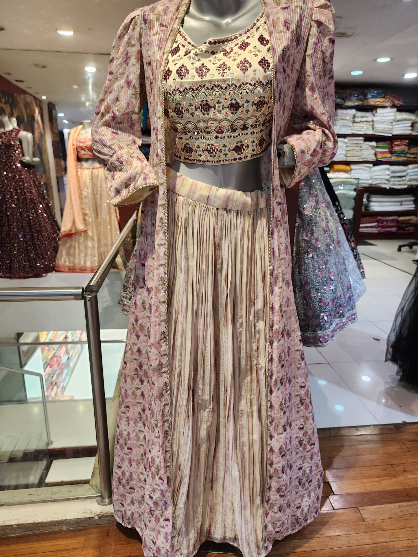 Cream tie and dye georgette lehenga with long jacket