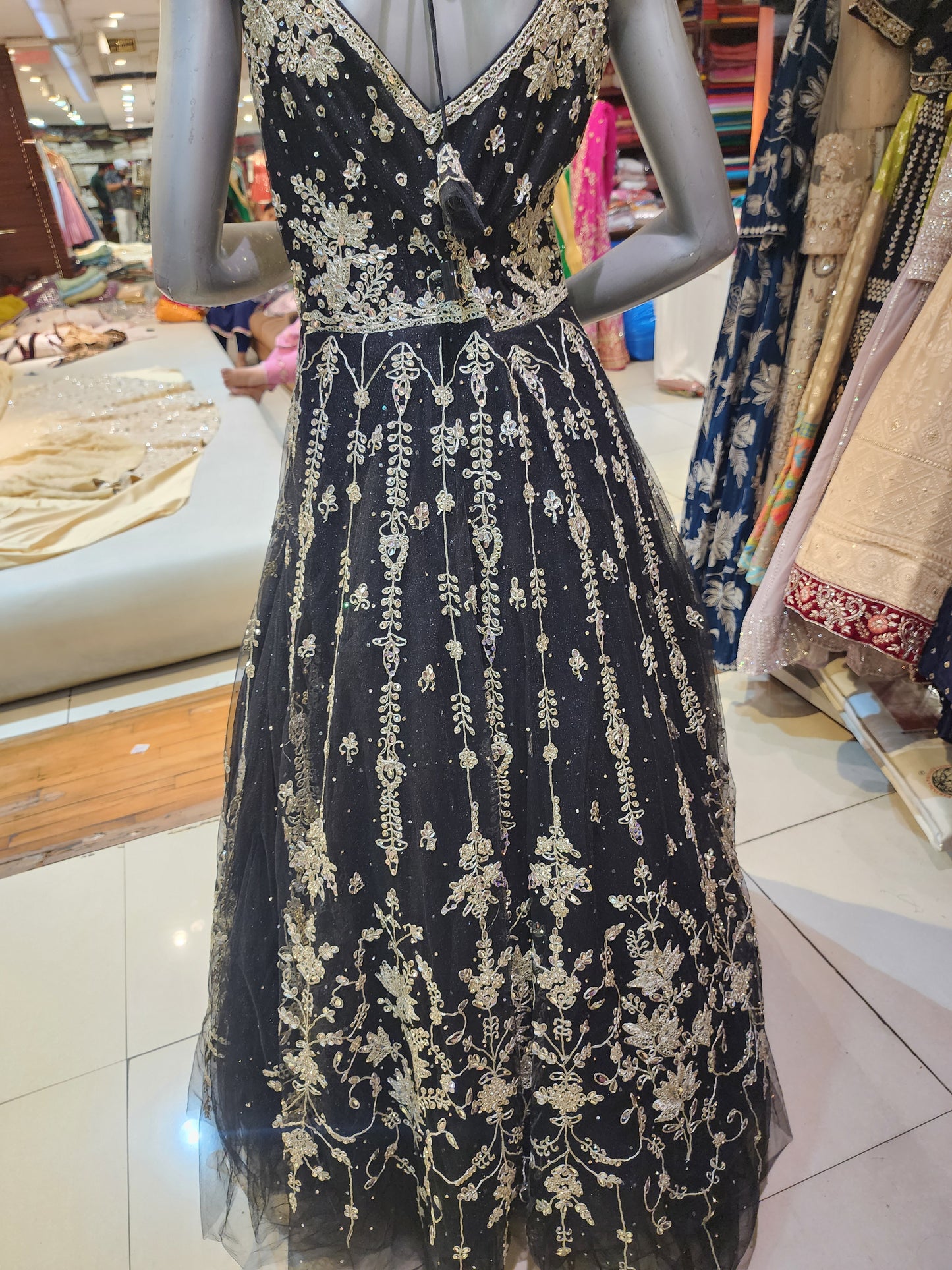 Black net dress with dori and zari work