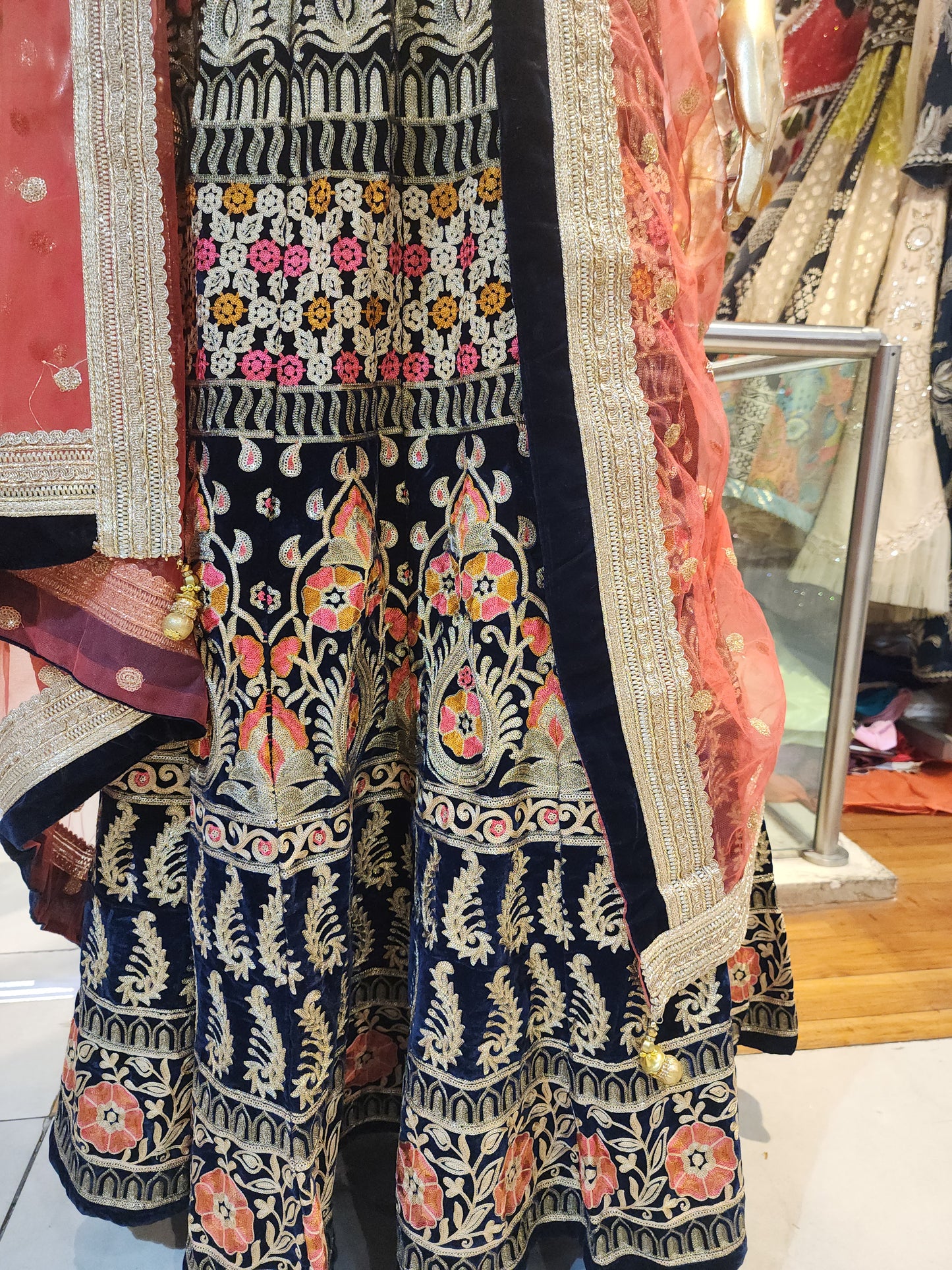 Navy blue velvet lehanga , multicolor aari work