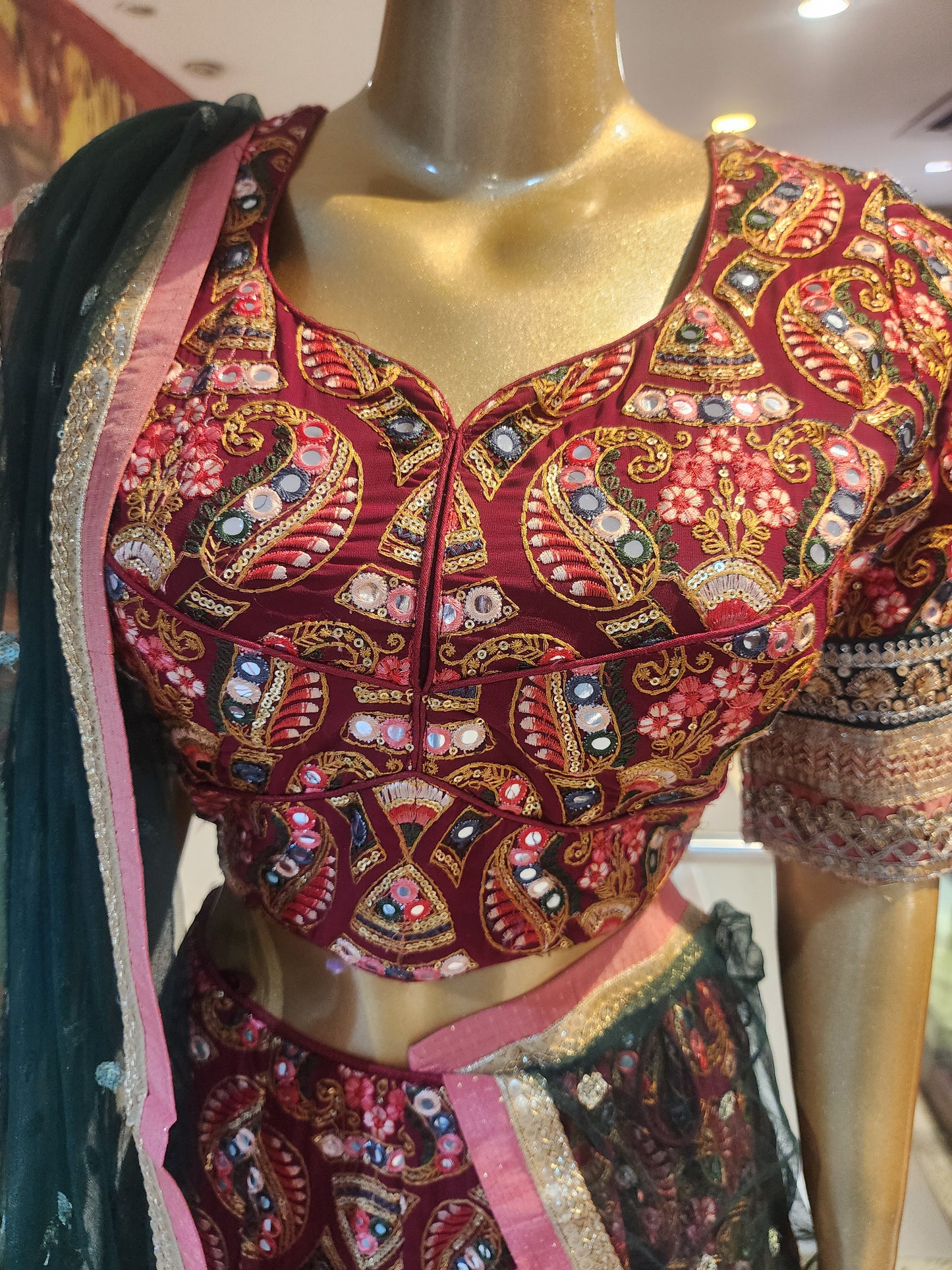 Maroon georgette multicolored work + zari border with net dupatta