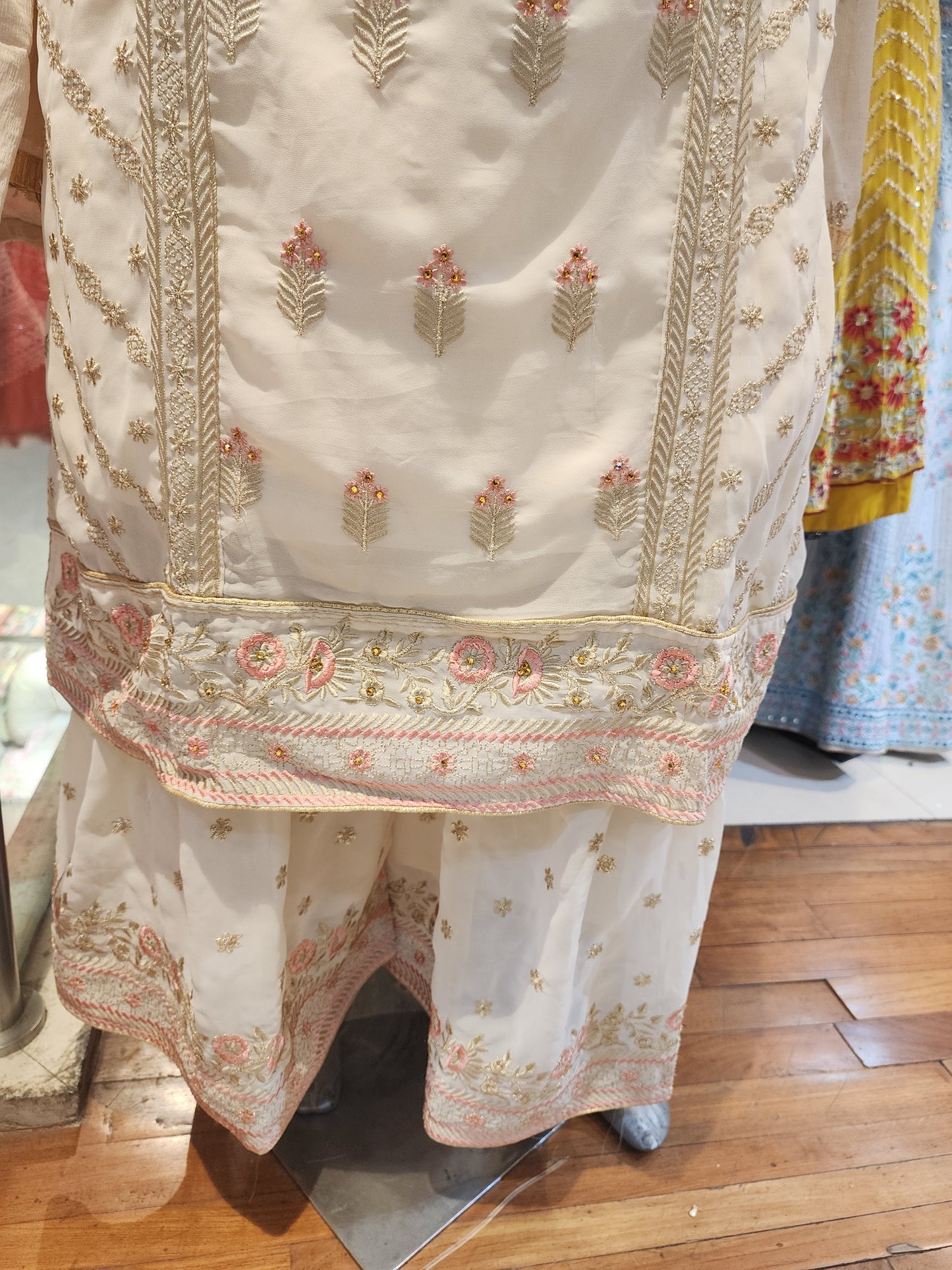 Cream colour georgette machine thread work sharara suit