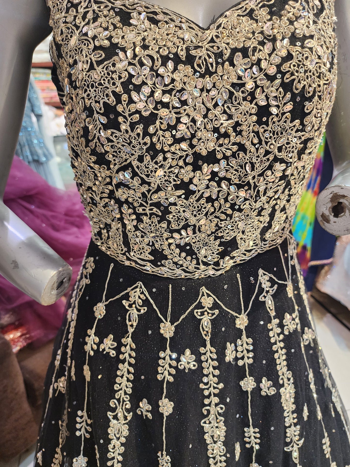 Black net dress with dori and zari work