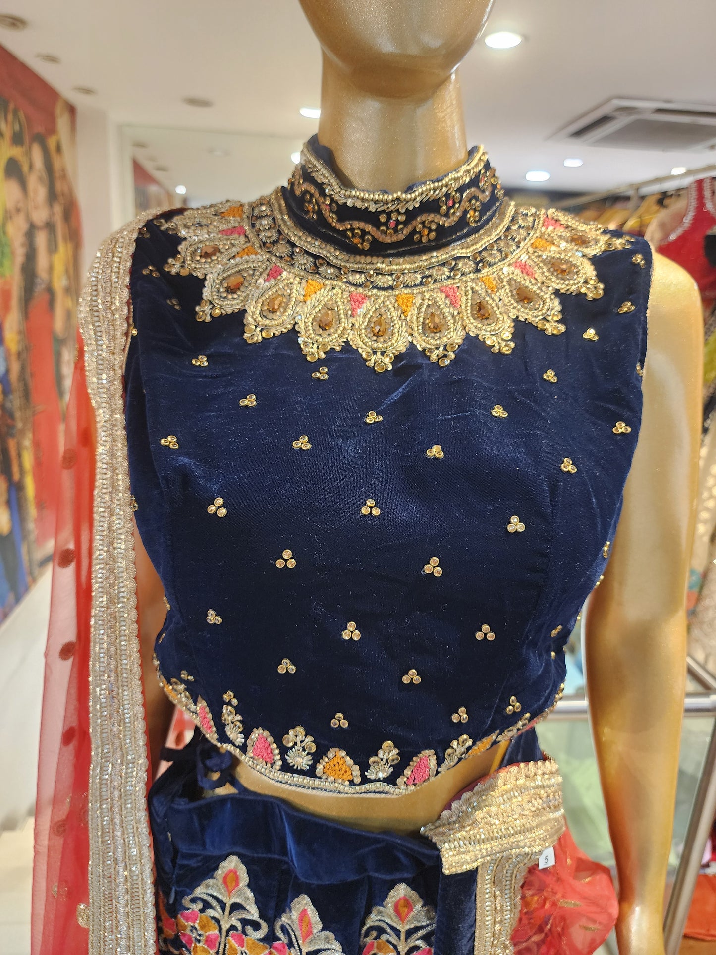 Navy blue velvet lehanga , multicolor aari work
