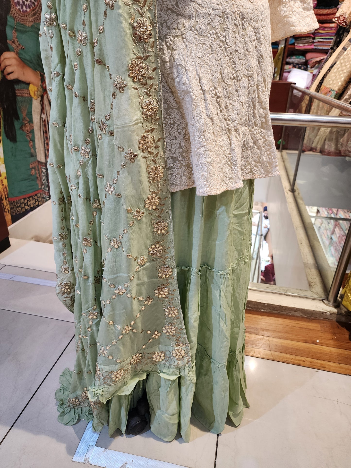 White and mint georgette lehenga with Lucknowi peplum top with gotapatti work dupatta