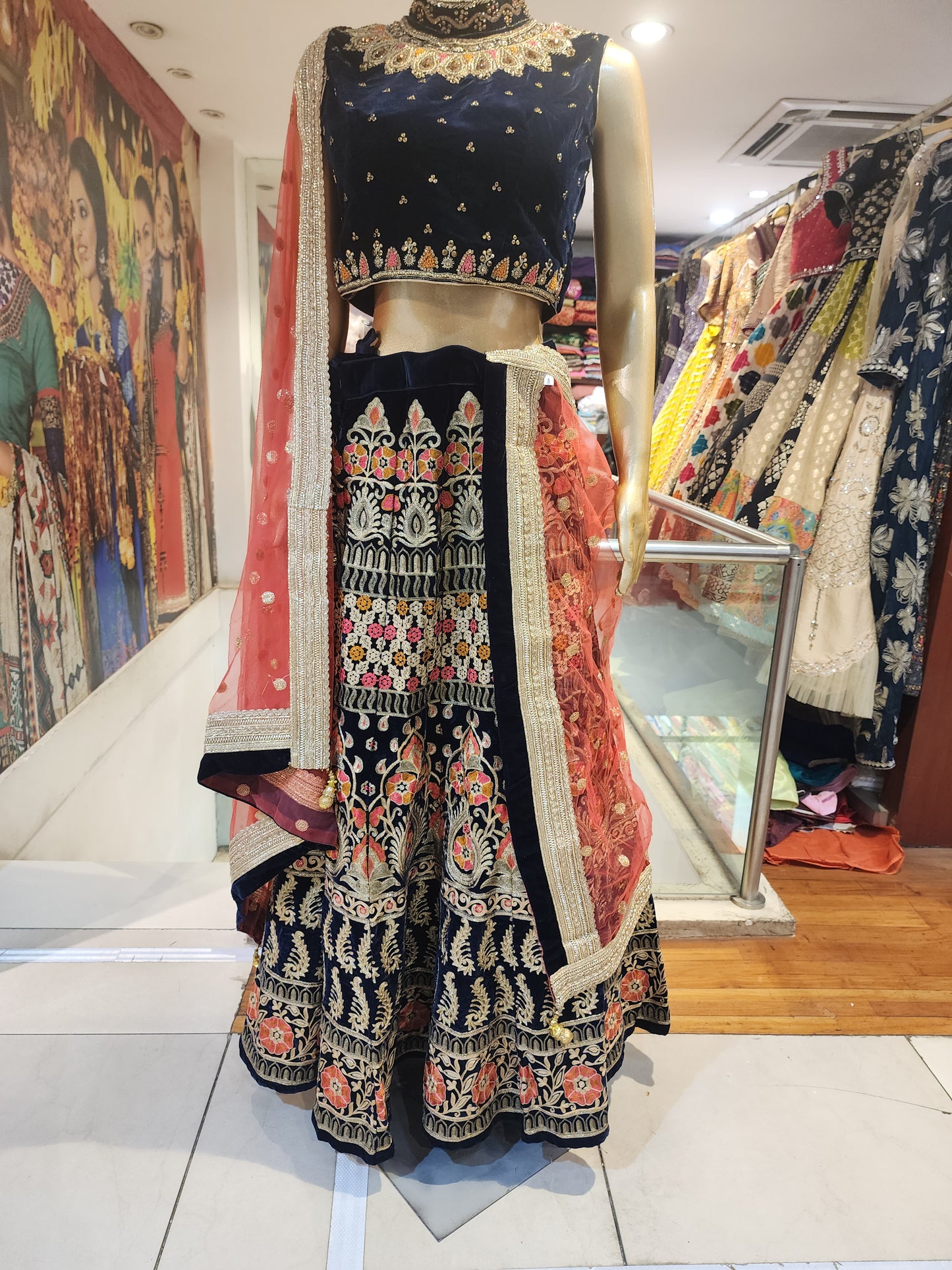 Navy blue velvet lehanga , multicolor aari work