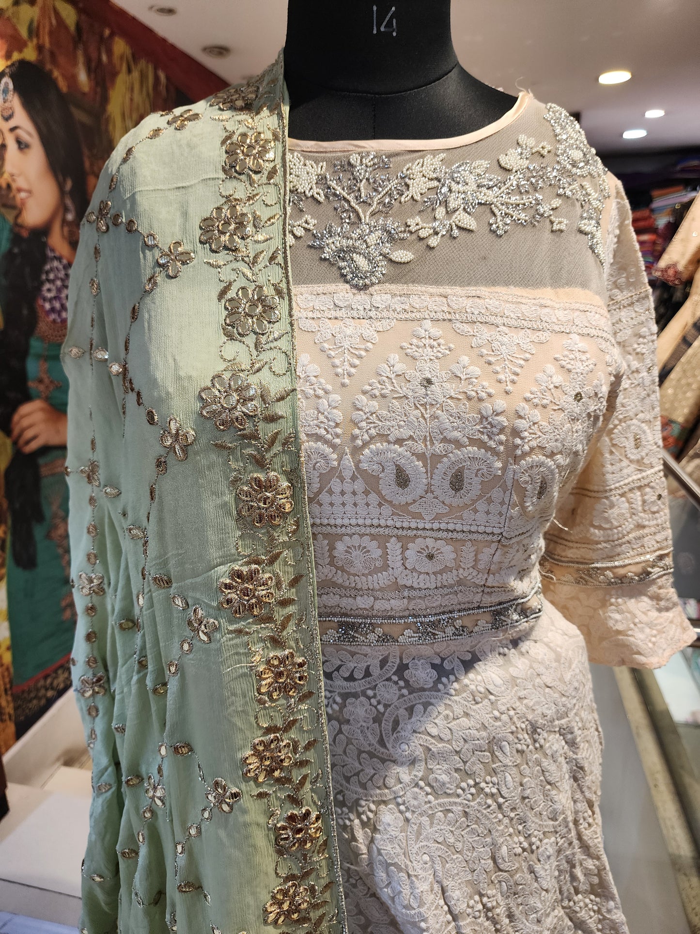 White and mint georgette lehenga with Lucknowi peplum top with gotapatti work dupatta