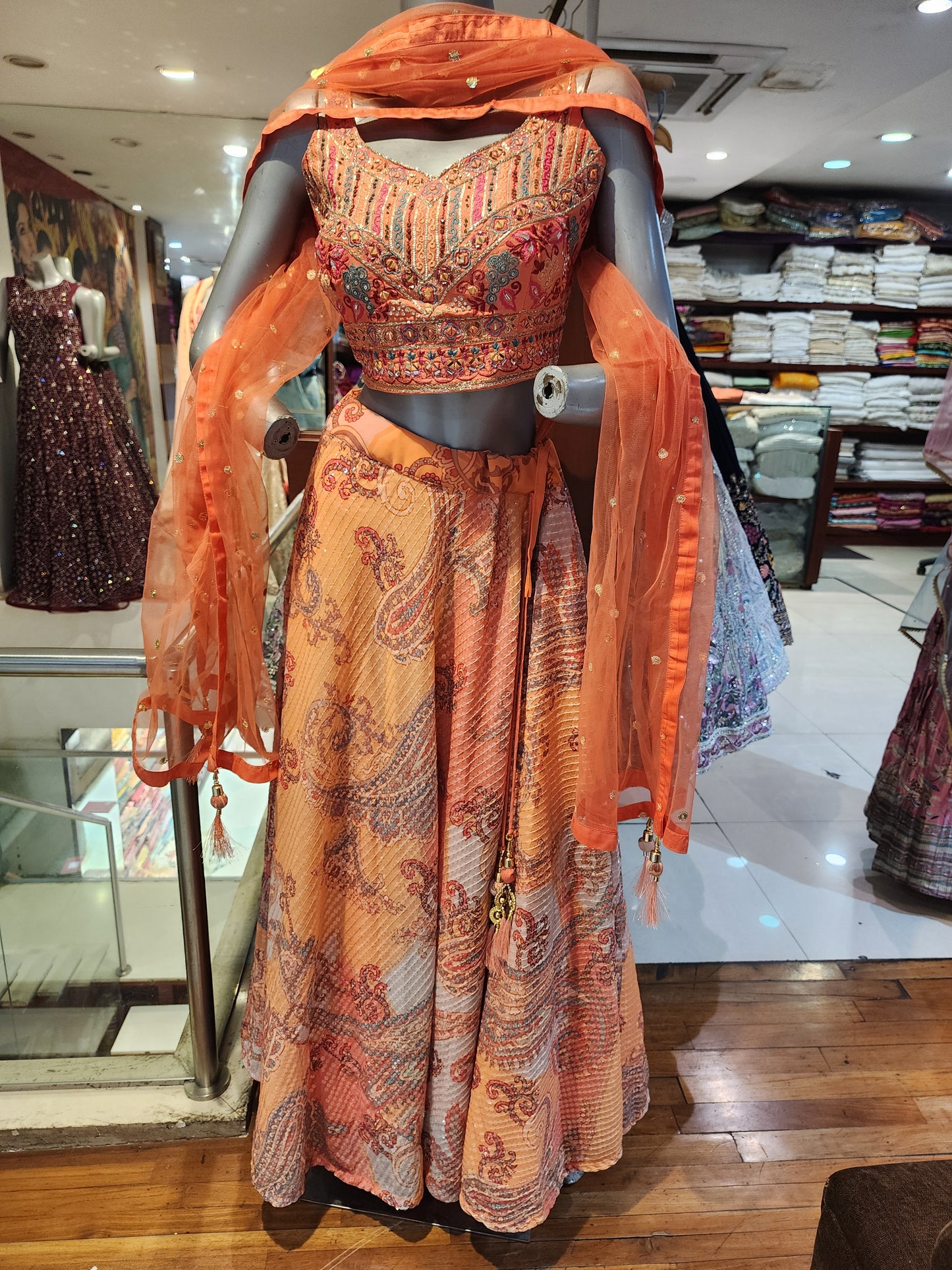 Orange chinon sequins lehenga with embroidered choli ,net dupatta