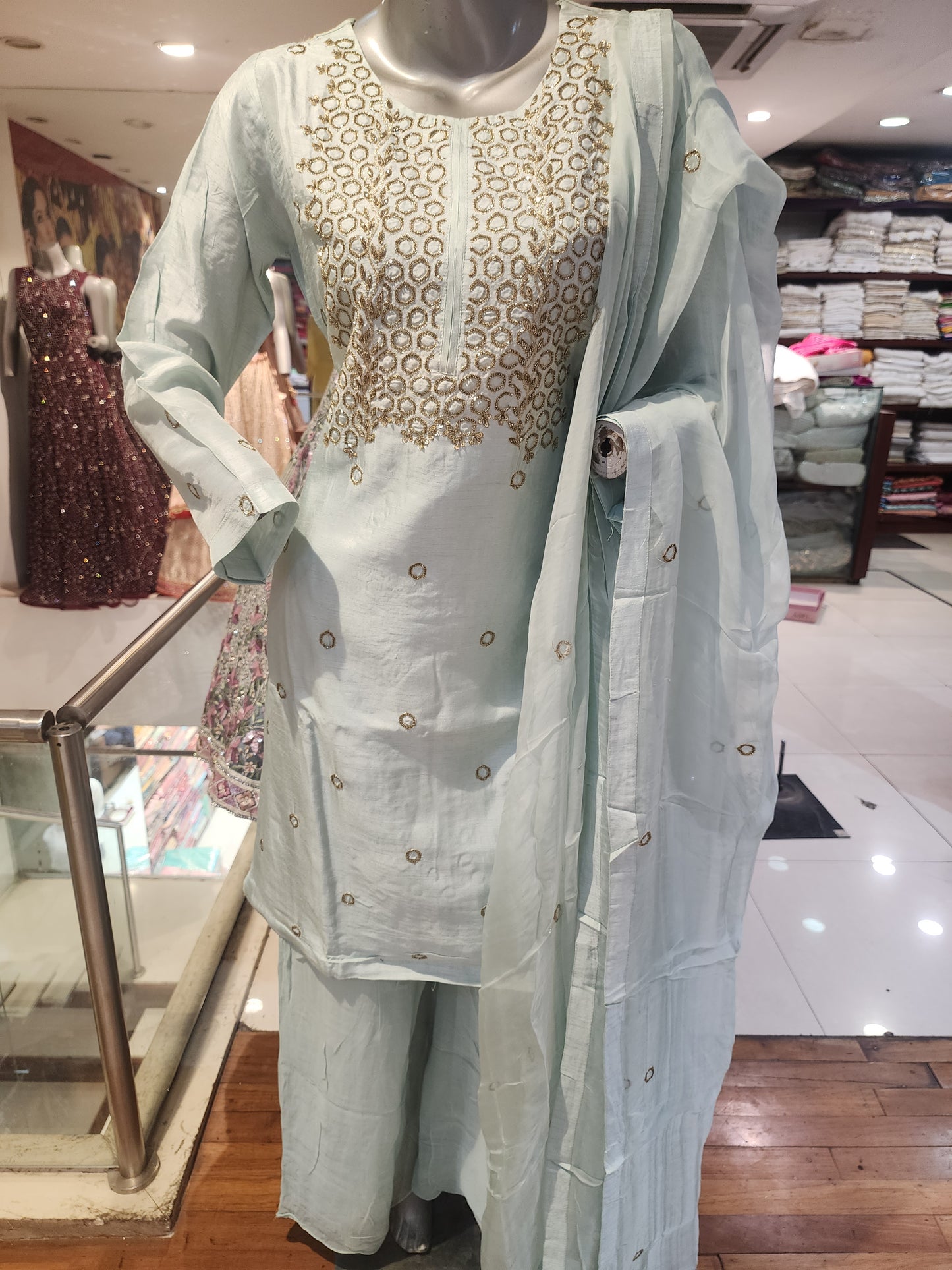 Sky blue semi raw silk umbrella plazzo suit. , zari + cut dana work