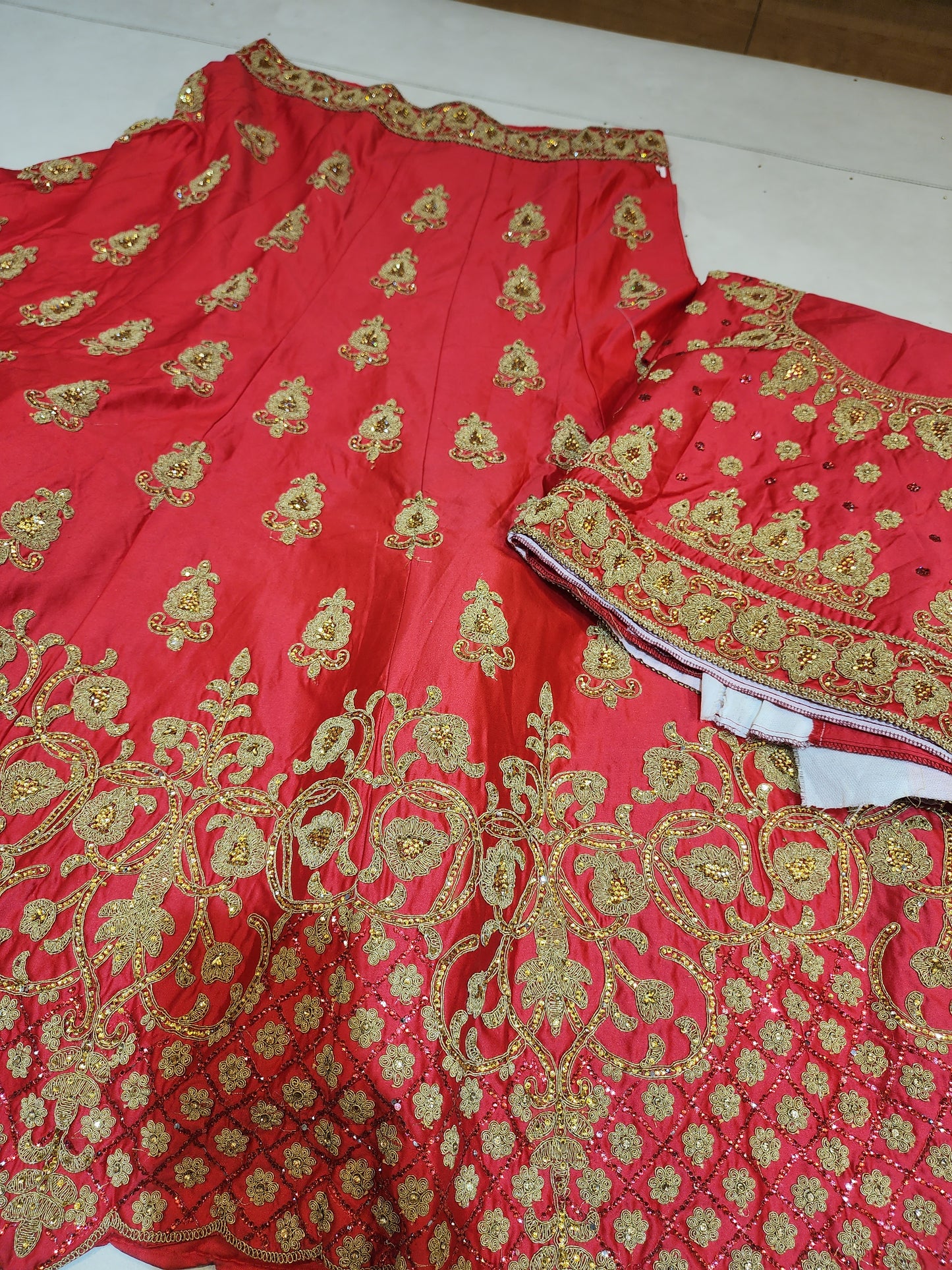 Red colour pure silk aari and servowski work lehanga unstiched