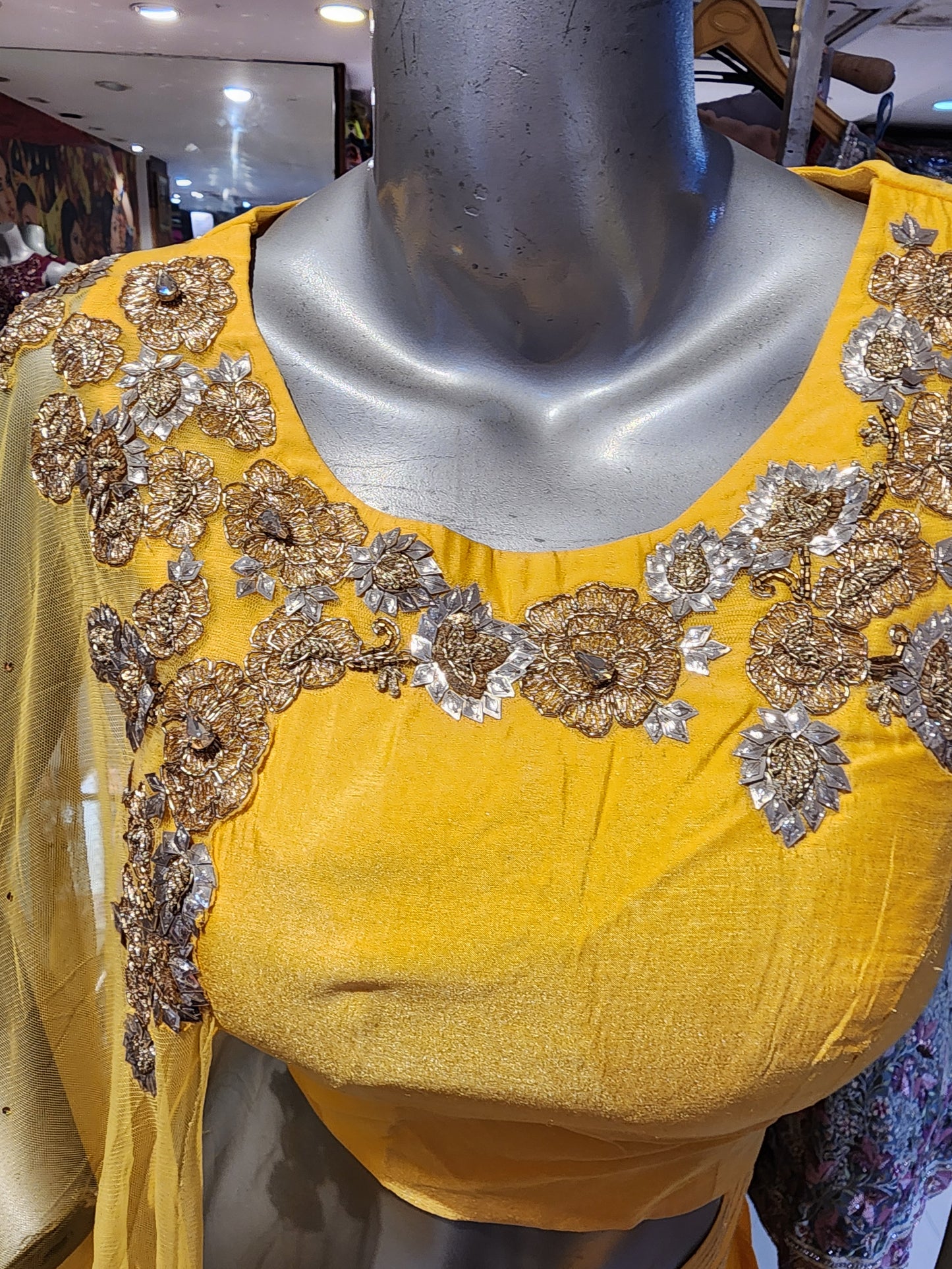 Yellow  silk lehenga  choli with patch work net drape one shoulder