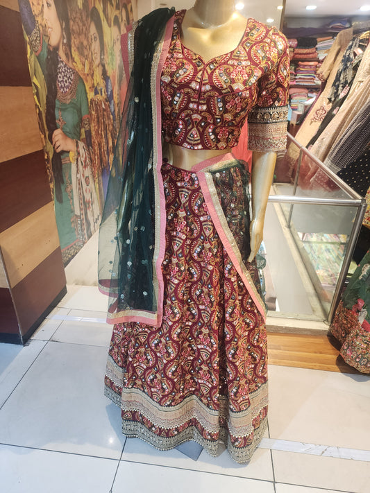 Maroon georgette  multicolored work + zari border with net dupatta