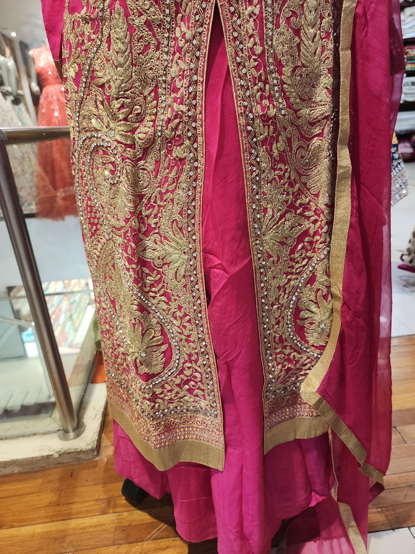 Pink colour achkan style suit with plazo band neck kunden work and all over aari work