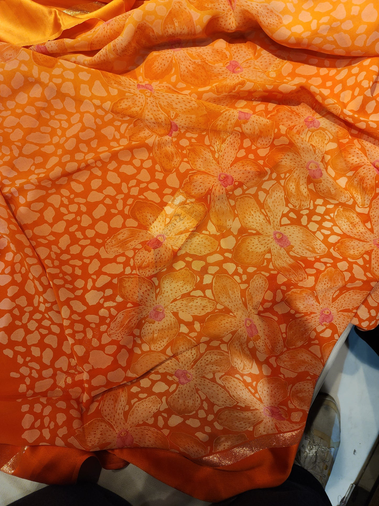 Georgette orange saree with Satin border in shaded . Printed blouse and pallu