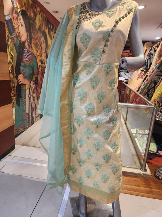 Golden colour semi raw silk shirt with pant  with net dupatta , resham + servowski  work + fancy button