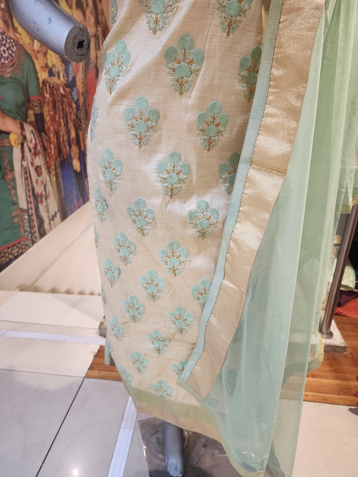 Golden colour semi raw silk shirt with pant  with net dupatta , resham + servowski  work + fancy button