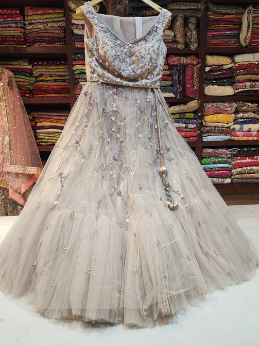 Readymade  dusty pink Pure net  lehanga with servowski  resham work