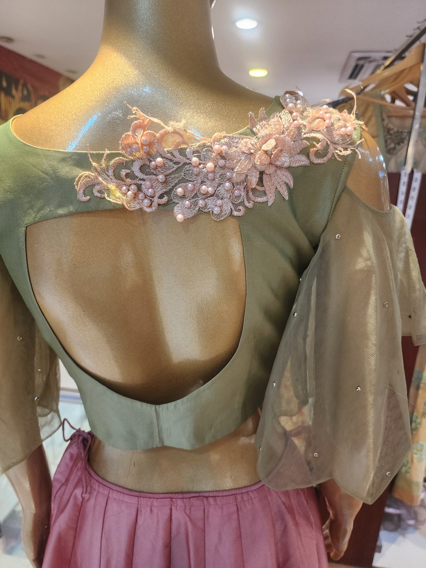 Peach colour pure silk lahanga with pista green colour blouse with patch work, net dupatta