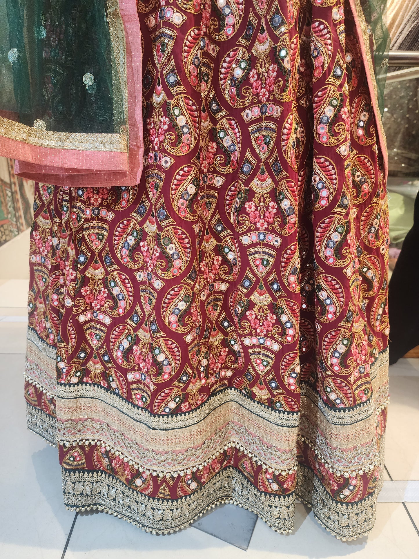 Maroon georgette  multicolored work + zari border with net dupatta