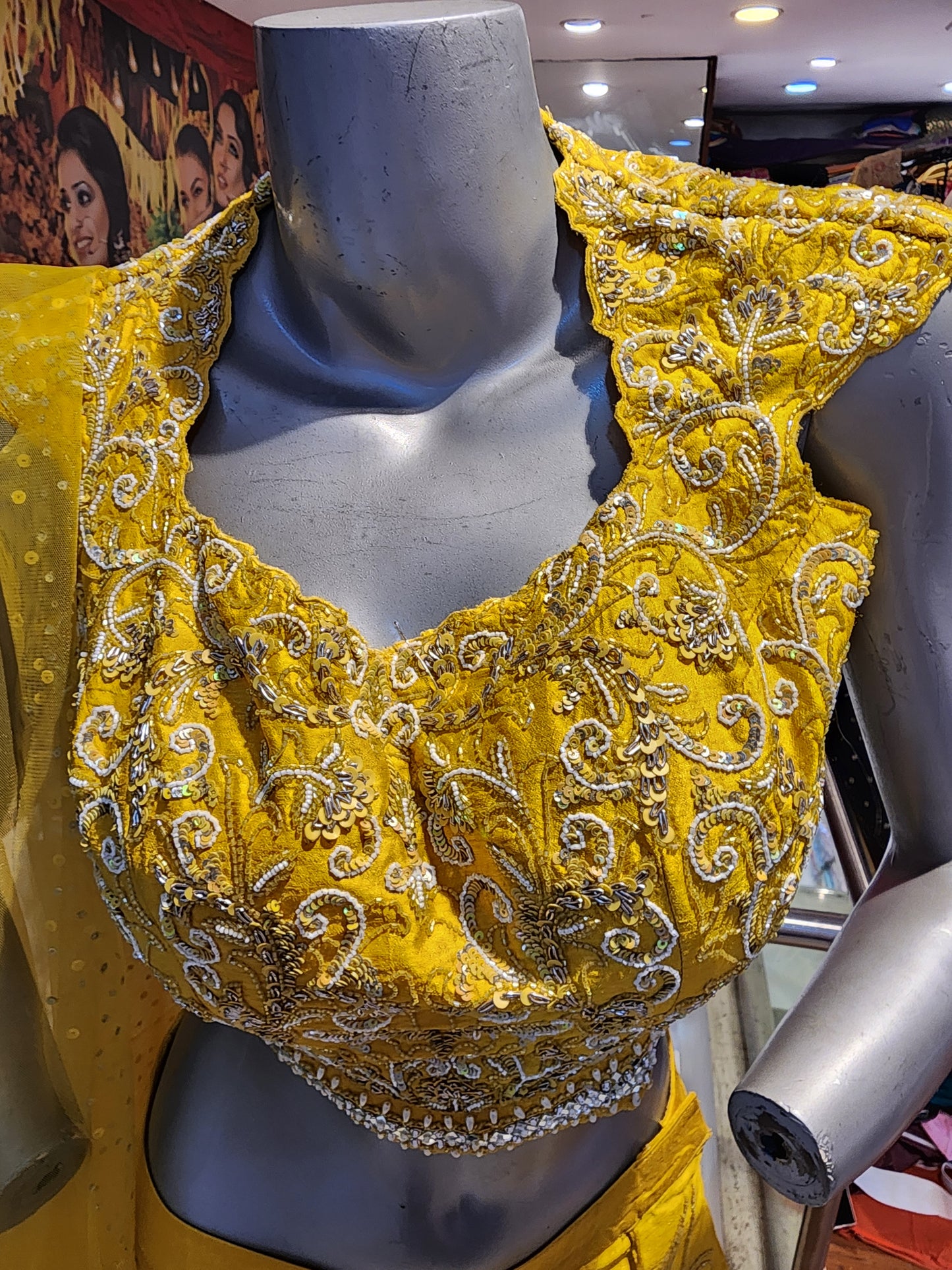 Yellow  colour raw silk lahanga with net frill  , hand work blouse, cut dana + pearl+ sequins + mirror work , with net dupatta
