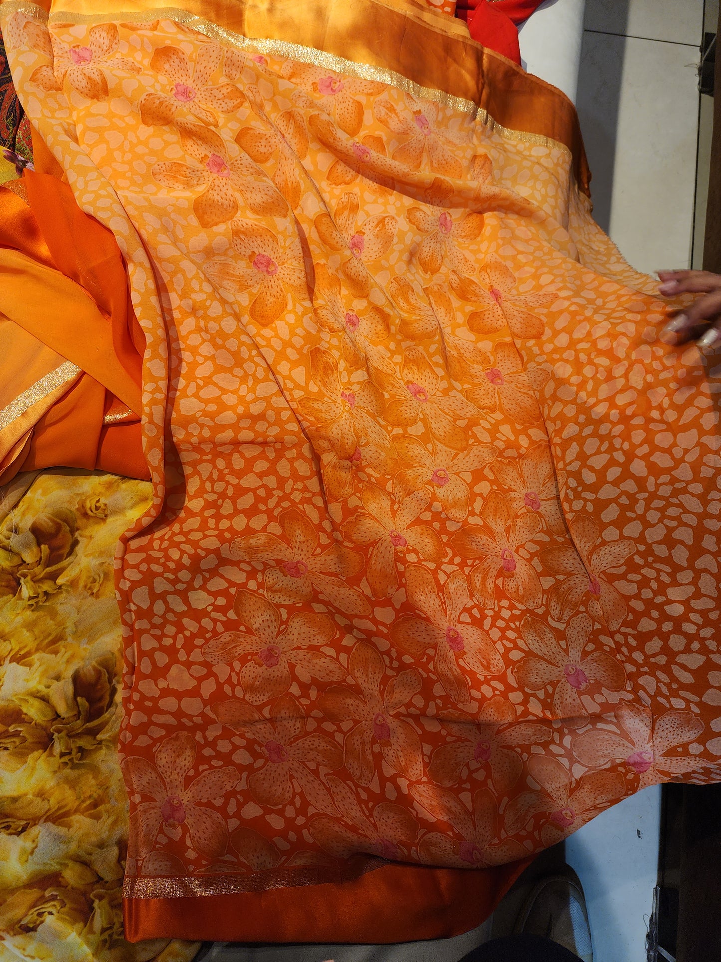 Georgette orange saree with Satin border in shaded . Printed blouse and pallu