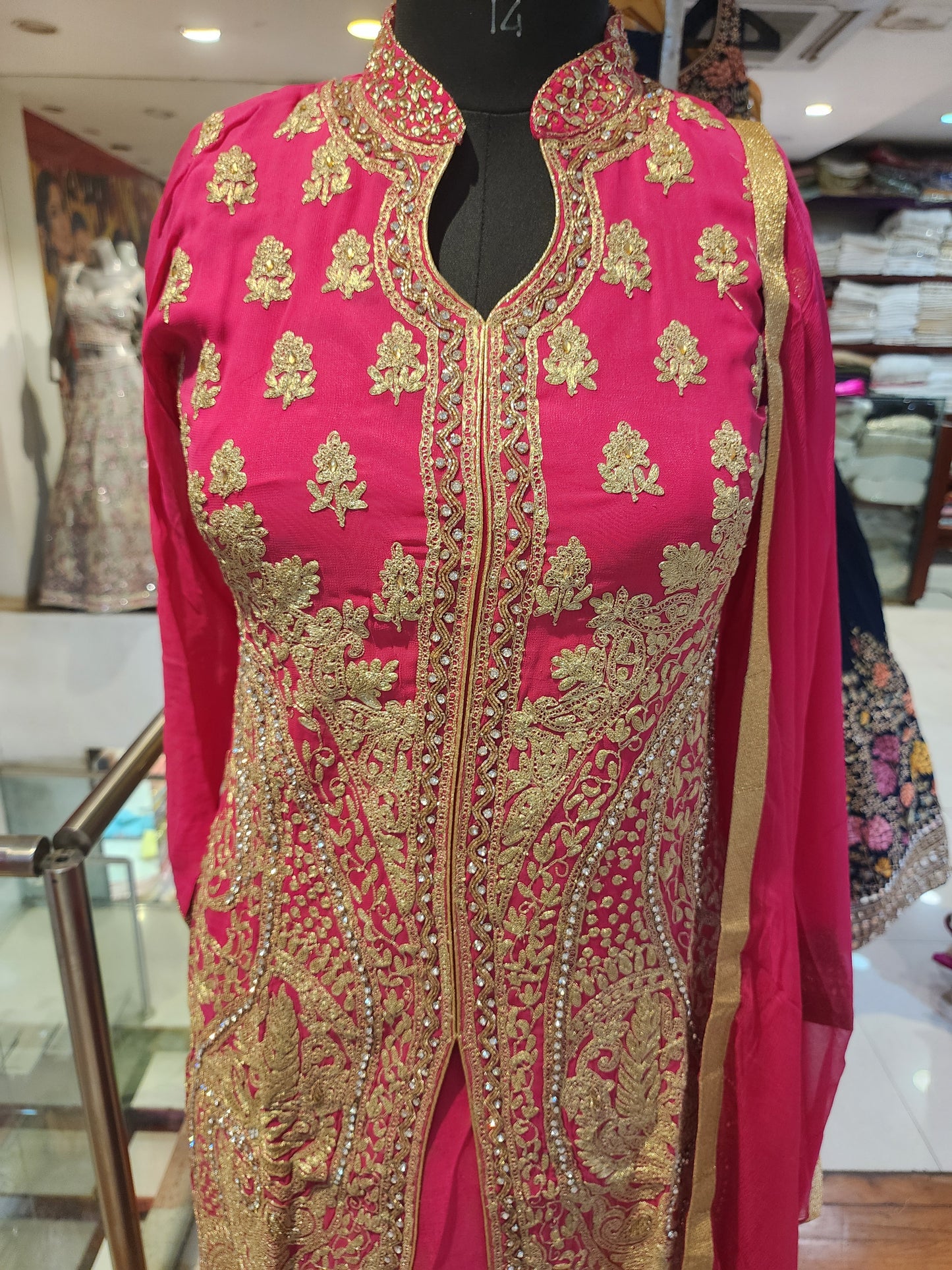 Pink colour achkan style suit with plazo band neck kunden work and all over aari work