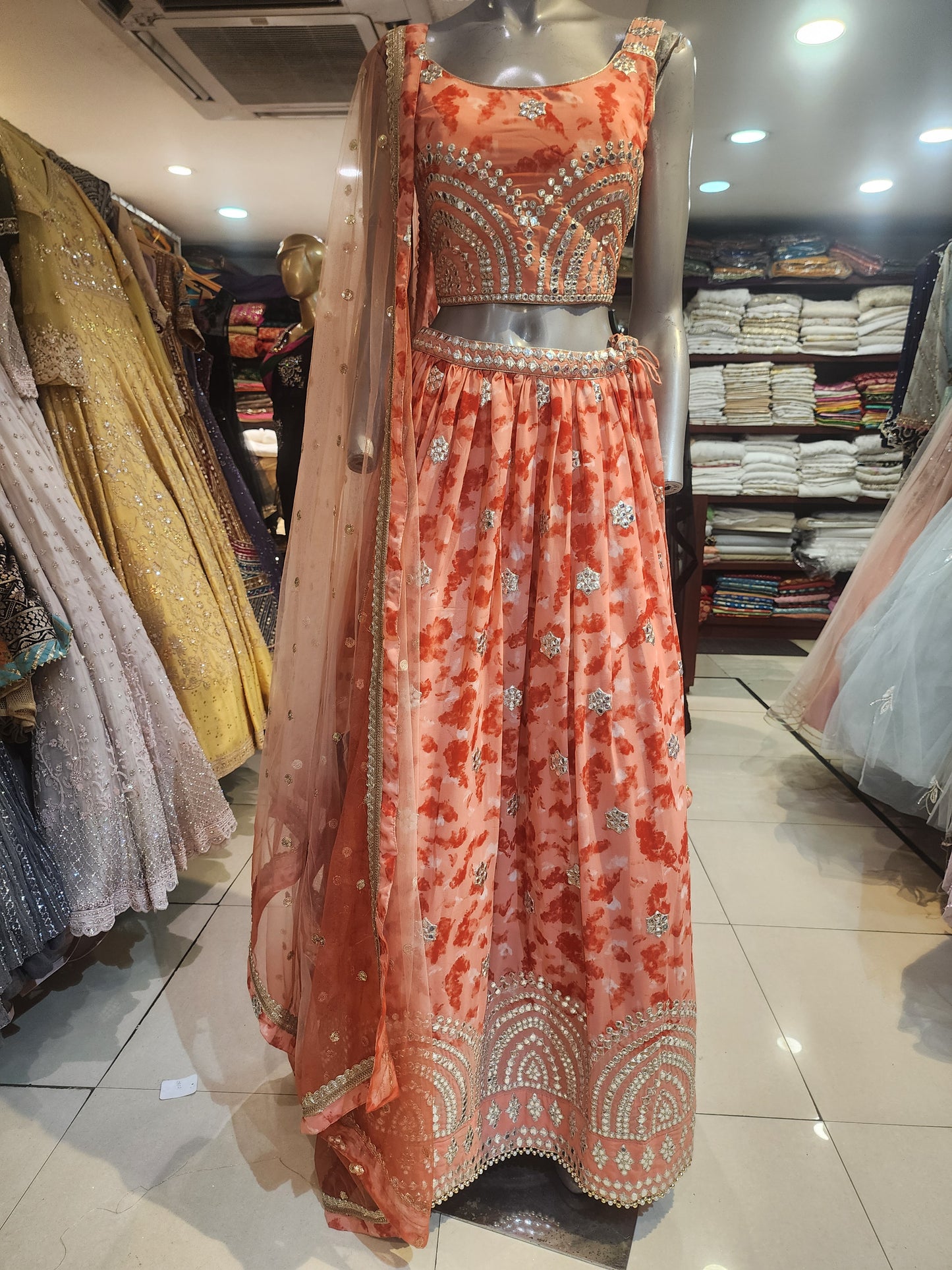 Orange  colour  georgette  lehanga gotta patti work with net dupatta