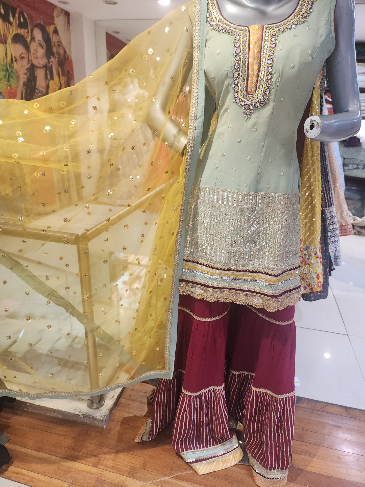Pista Green georgette  shirt Meroon colour garara with yellow net dupatta , hand embroidered  neck and machine  work