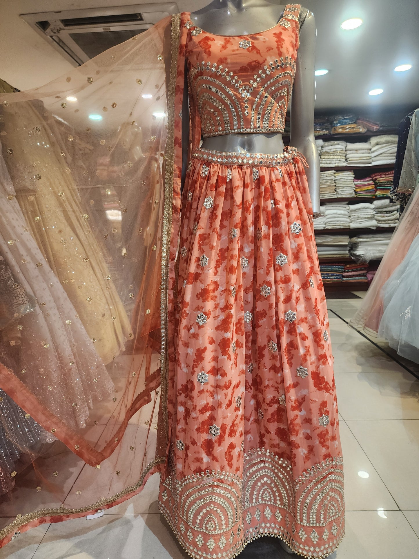 Orange  colour  georgette  lehanga gotta patti work with net dupatta
