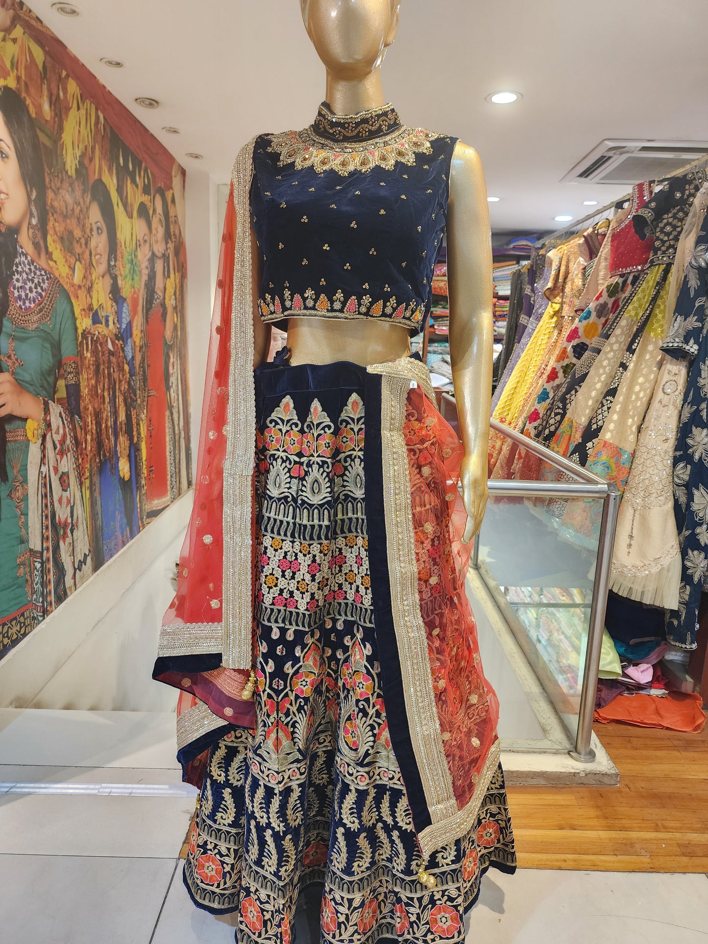Navy blue velvet lehanga , multicolor aari work