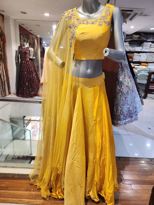 Yellow  silk lehenga  choli with patch work net drape one shoulder