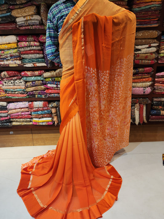 Georgette orange saree with Satin border in shaded . Printed blouse and pallu