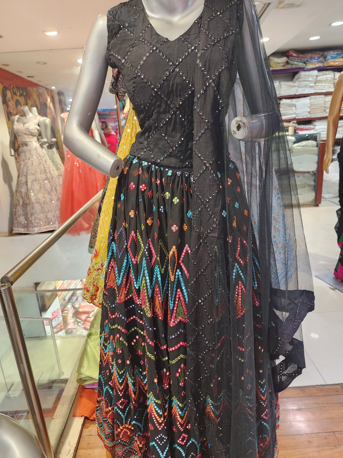 Black colour semi georgette  multicolour lezar work lehanga with net dupatta