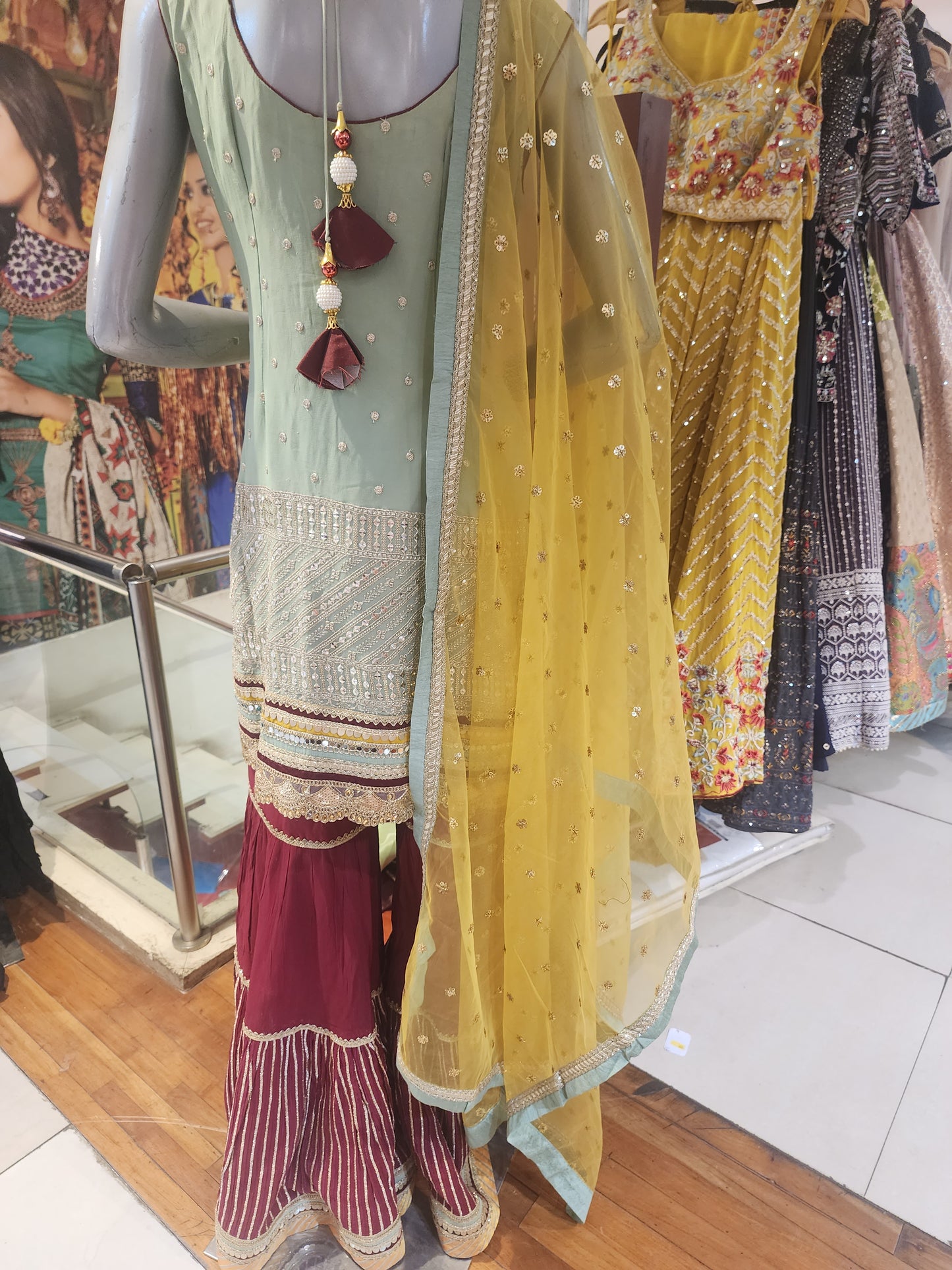 Pista Green georgette  shirt Meroon colour garara with yellow net dupatta , hand embroidered  neck and machine  work