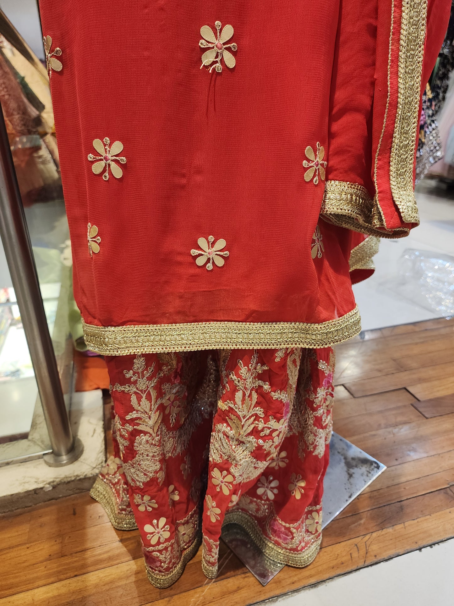 Red colour georgette semi stitch shirt with stitch  sharara suit, gota patti + Jari + resham work with georgette  dupatta