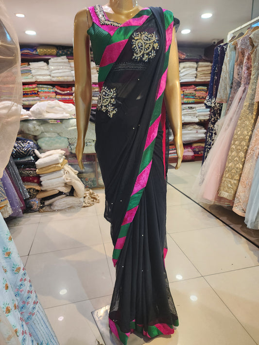 Black georgette saree with readymade  blouse , multicolored  velvet border and zerkan booti