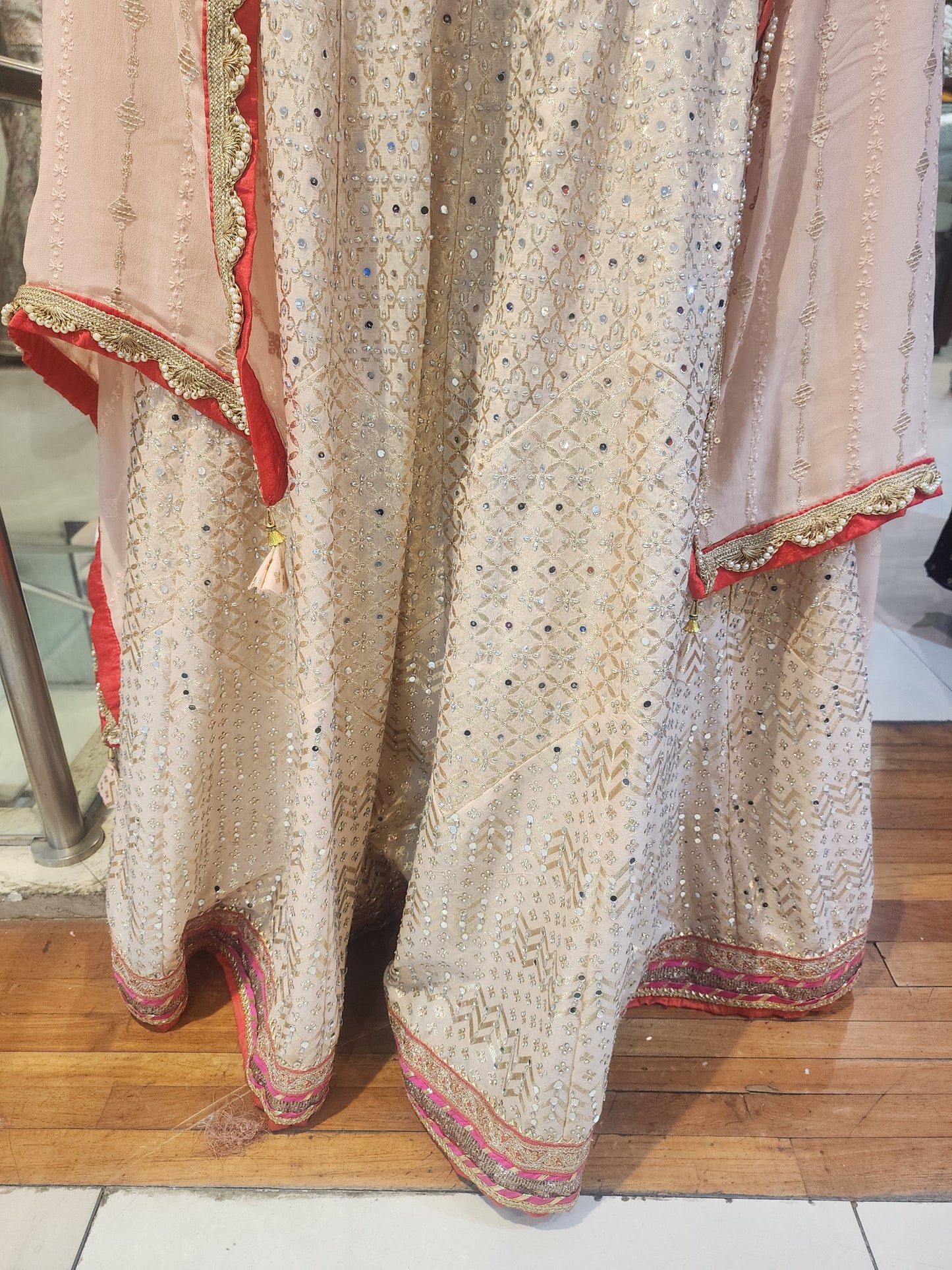 Peach Banarsi lehanga mirror + stone work , Red hand work resham + cut dana+ stone + mirror work blouse with georgette  dupatta