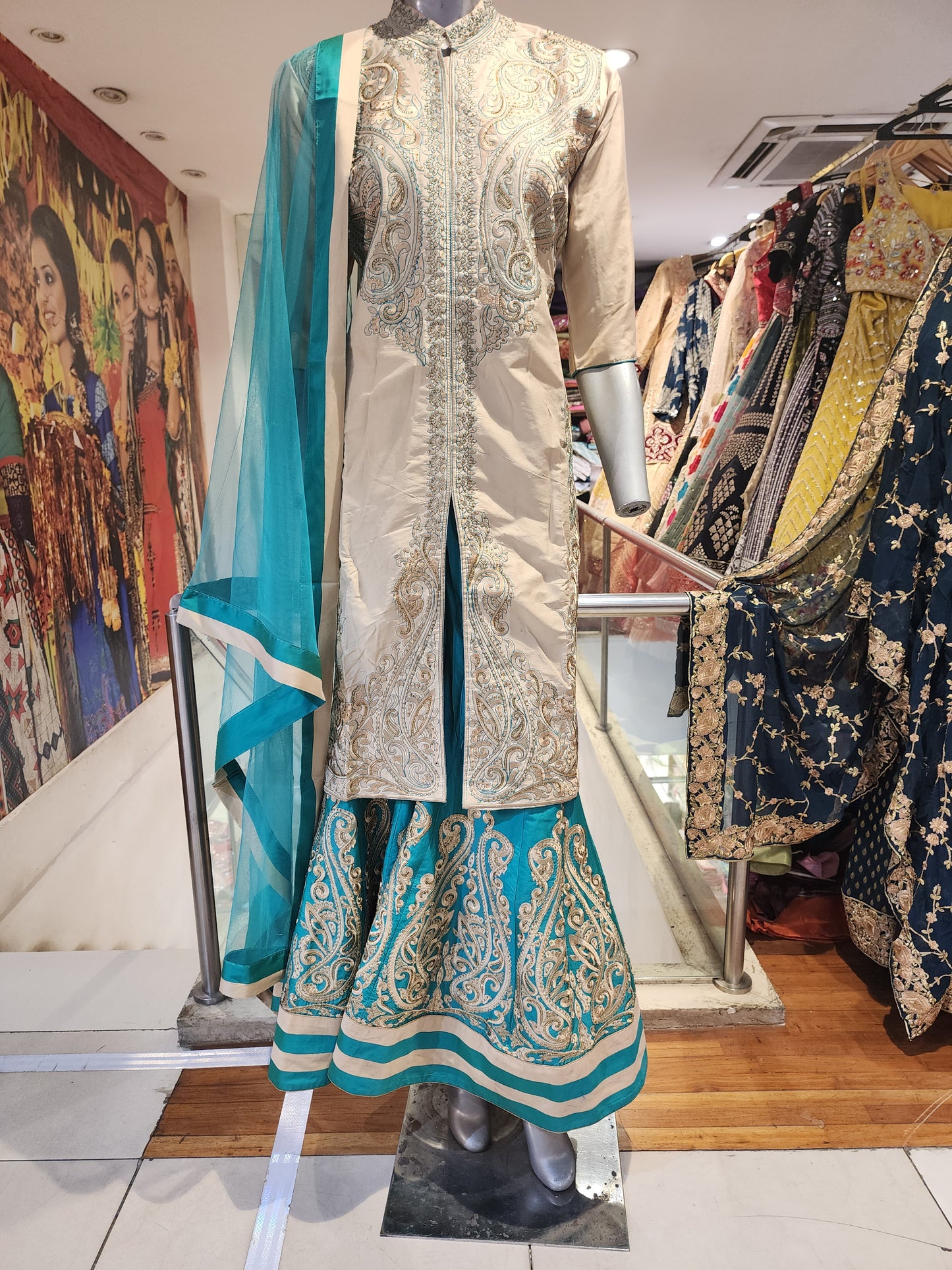 Semi silk achkan style  golden colour shirt with rama Green sharara with net dupatta