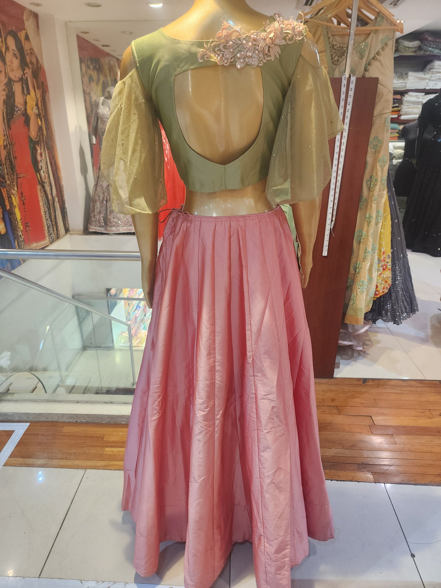 Peach colour pure silk lahanga with pista green colour blouse with patch work, net dupatta