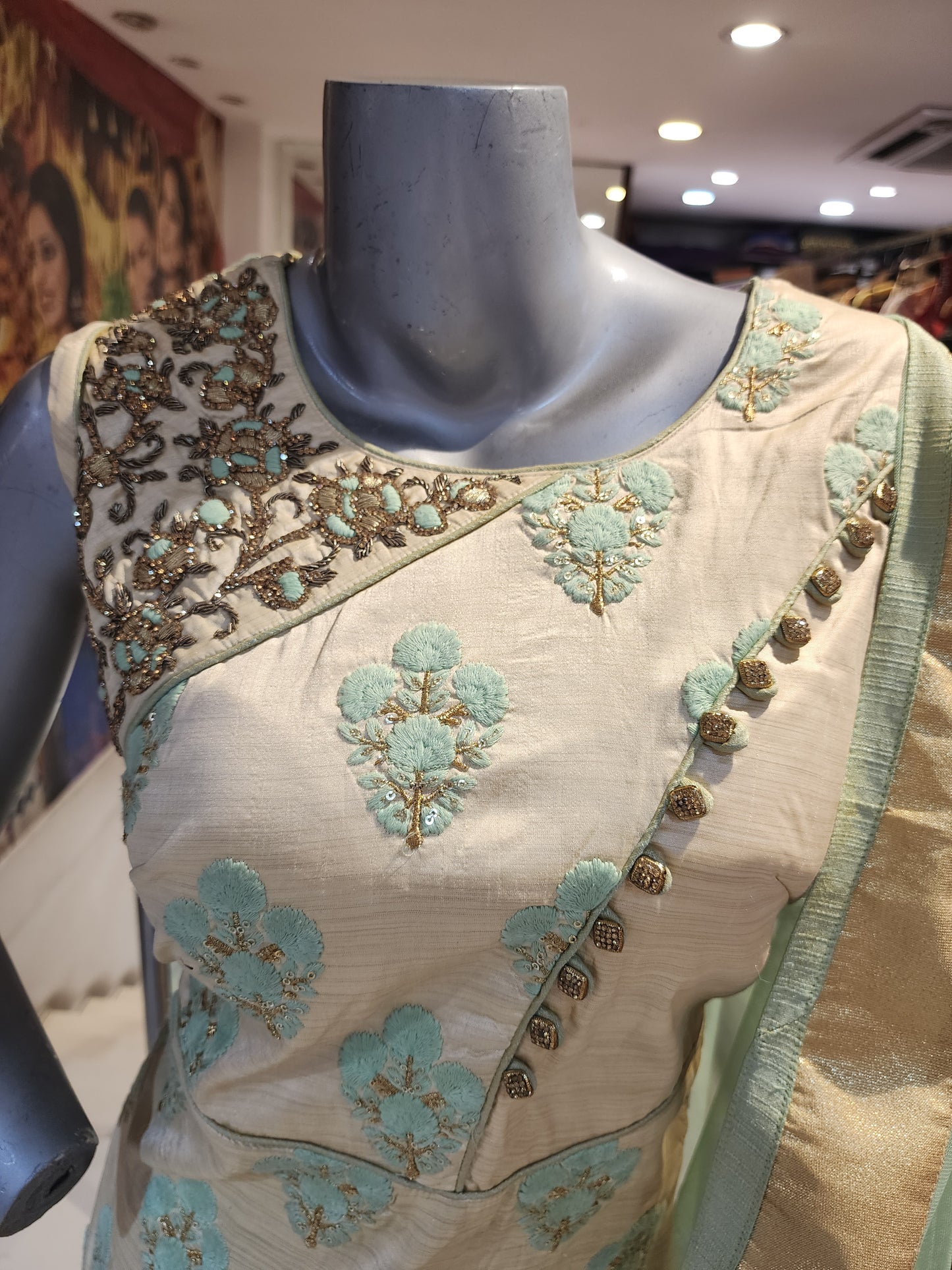 Golden colour semi raw silk shirt with pant  with net dupatta , resham + servowski  work + fancy button