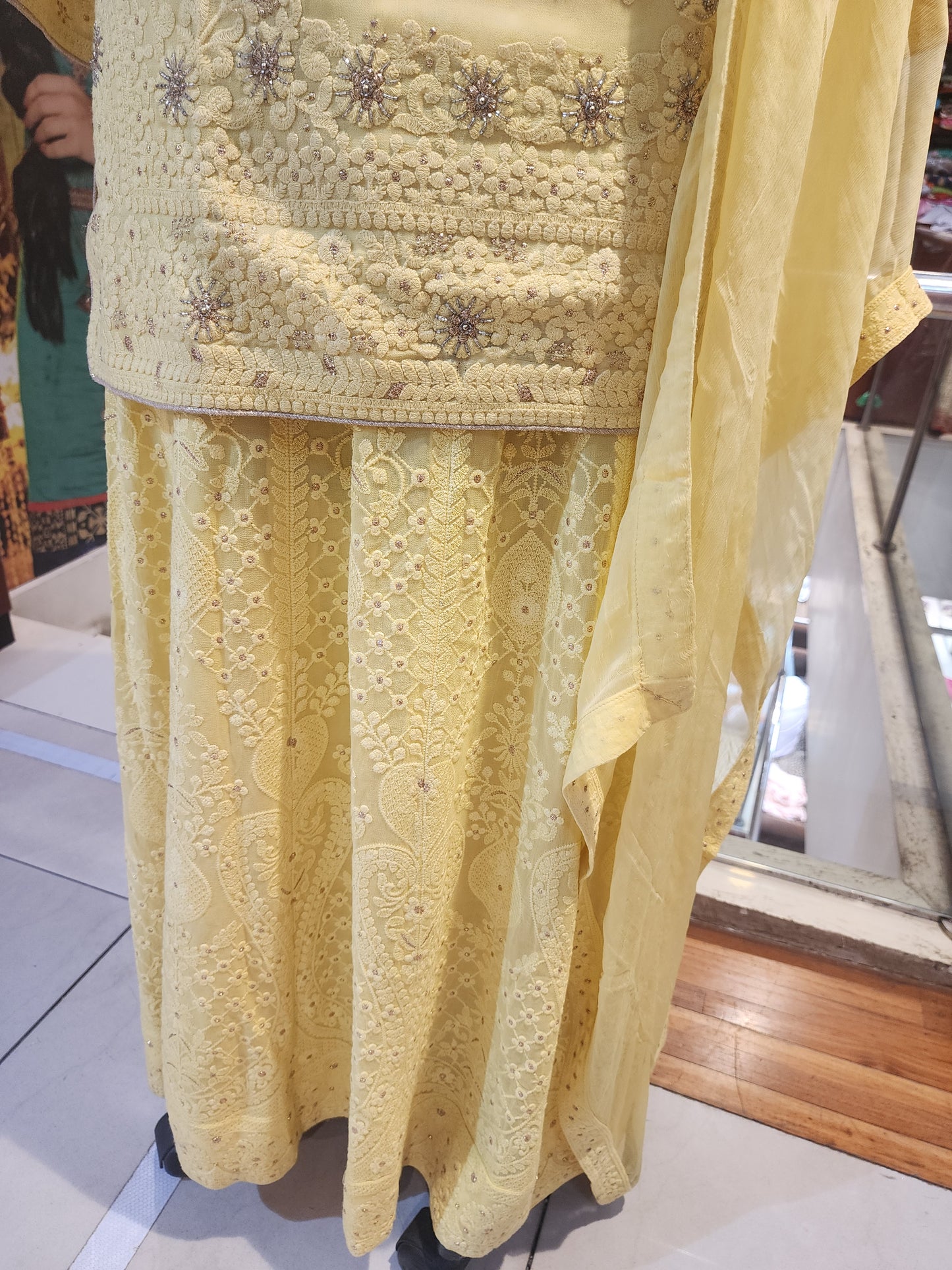 Yellow colour georgette  chikankari stitched suit with chikankari lehanga , chiffon dupatta